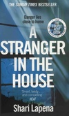  Achetez le livre d'occasion A stranger in the house sur Livrenpoche.com 